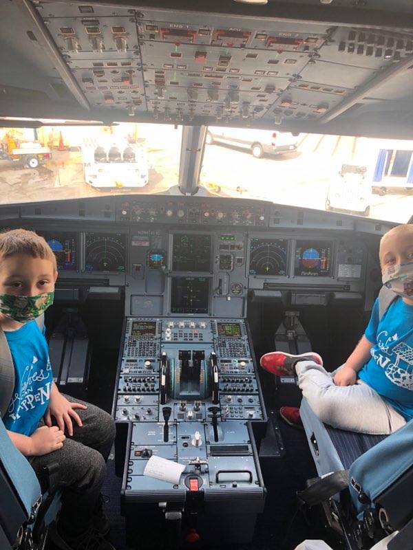 Nolan and Brother in Cockpit