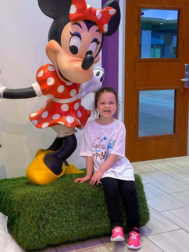 Madison at GKTW with Minnie Statue