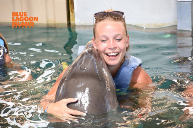 Maryna with Dolphin on Cruise