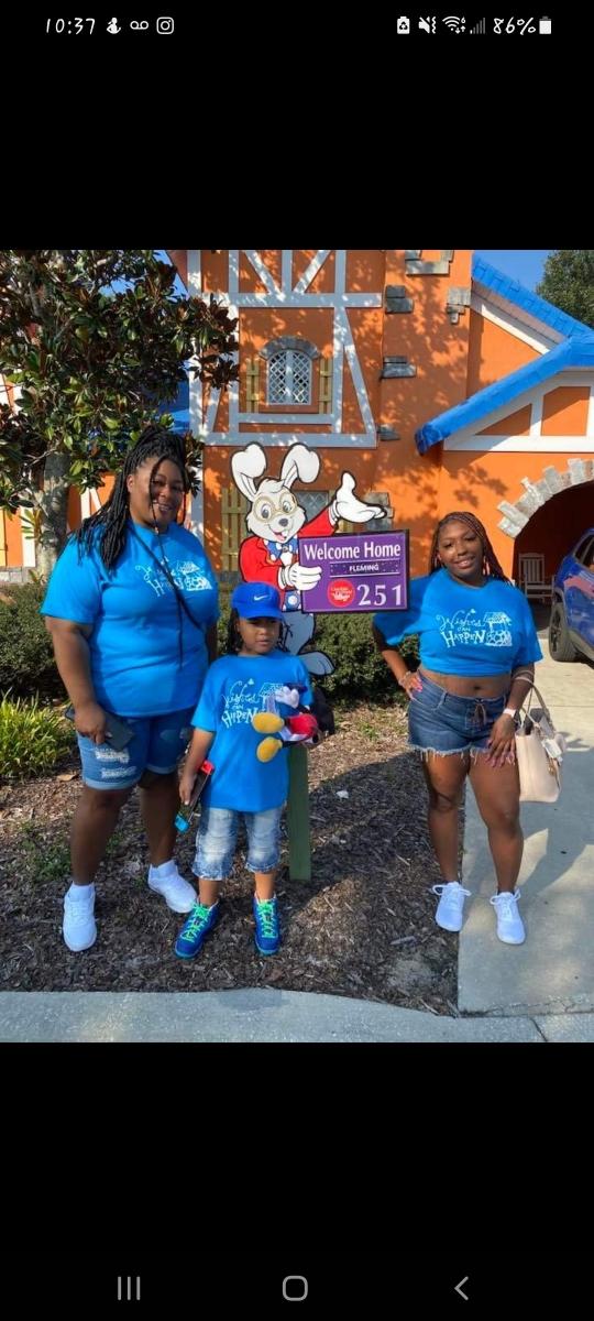 Jakhai with family in wishes shirts