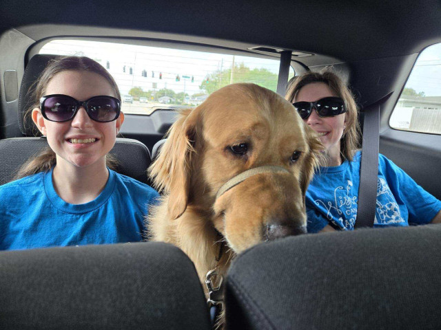 Jana and Sister and Graham in Back Seat of Car
