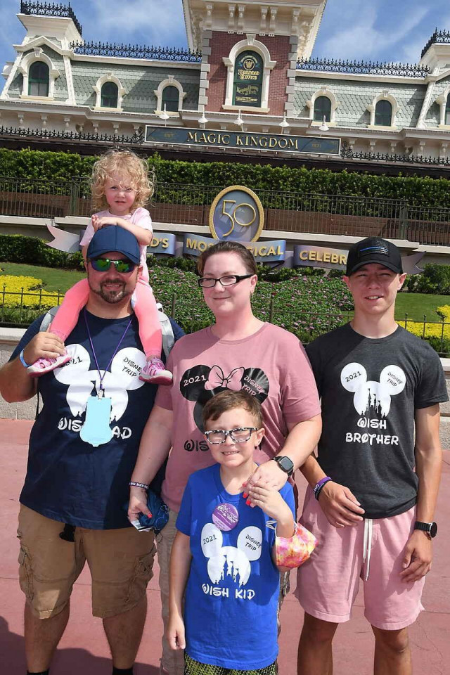 Jonathan and Family at Disney Entrance