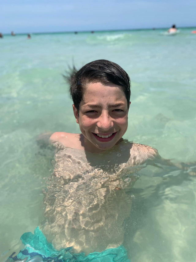 Christian Smiling in Water