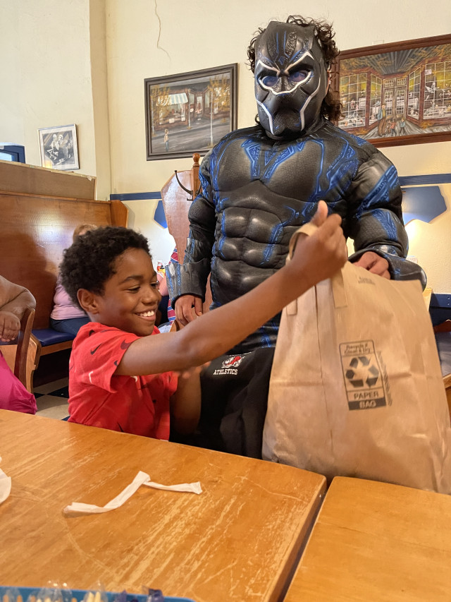 Kyree Receiving Gift from Black Panther