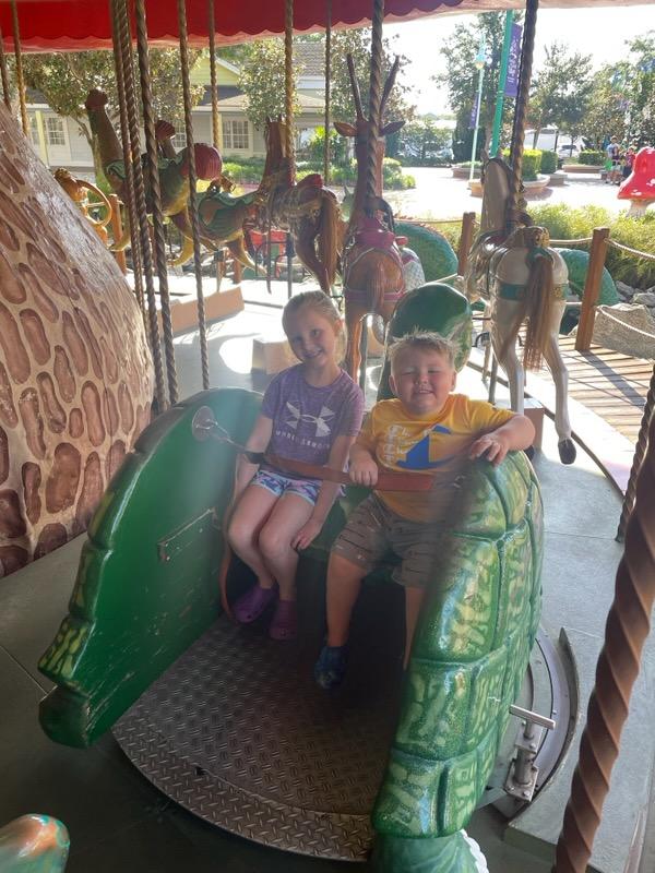Lincoln and sister on Carousel at GKTW