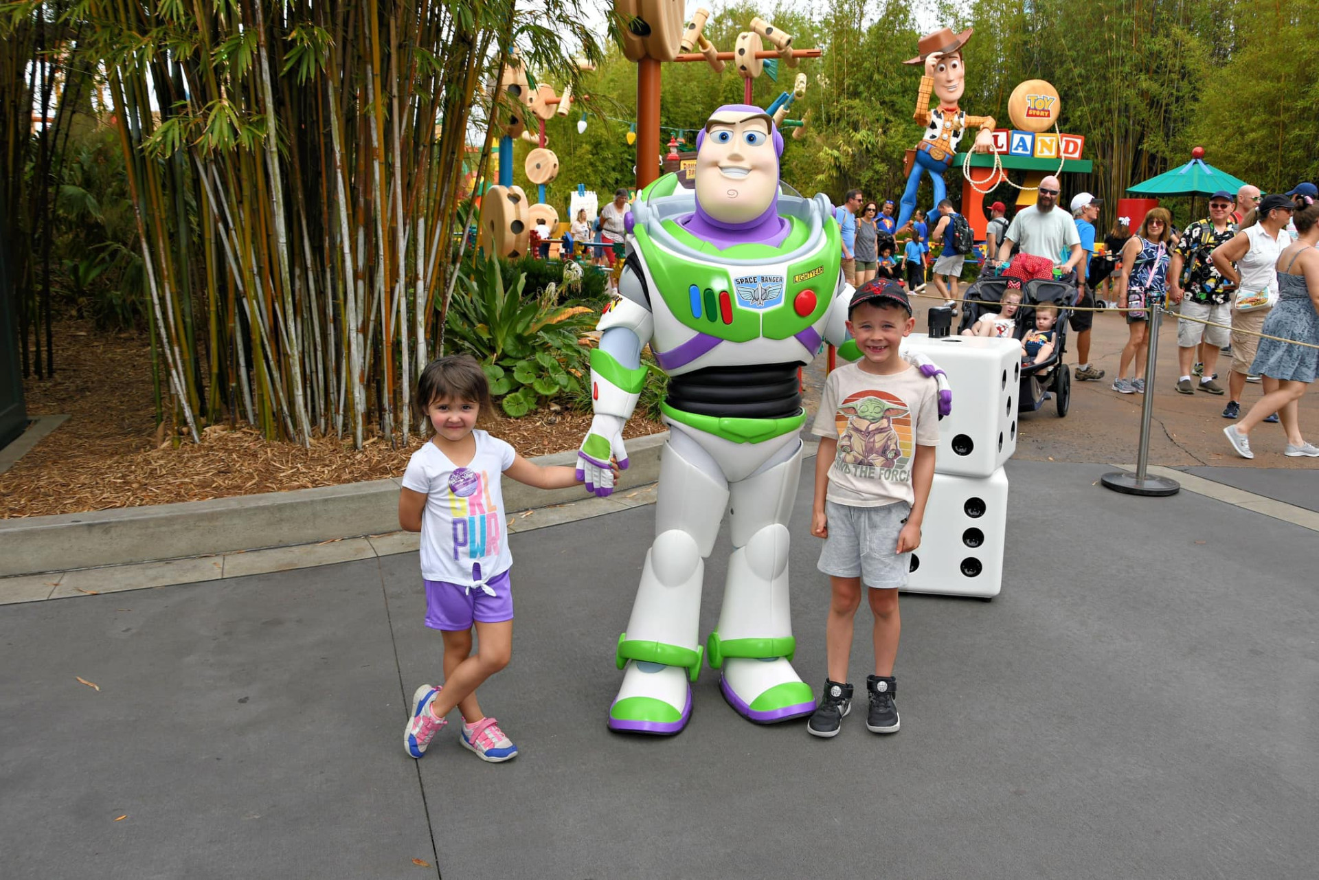 Kori and Kane with Buzz Lightyear