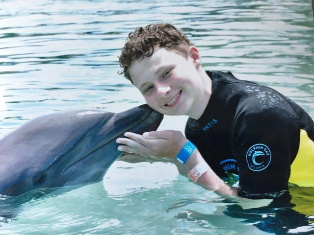 Caden with Dolphin