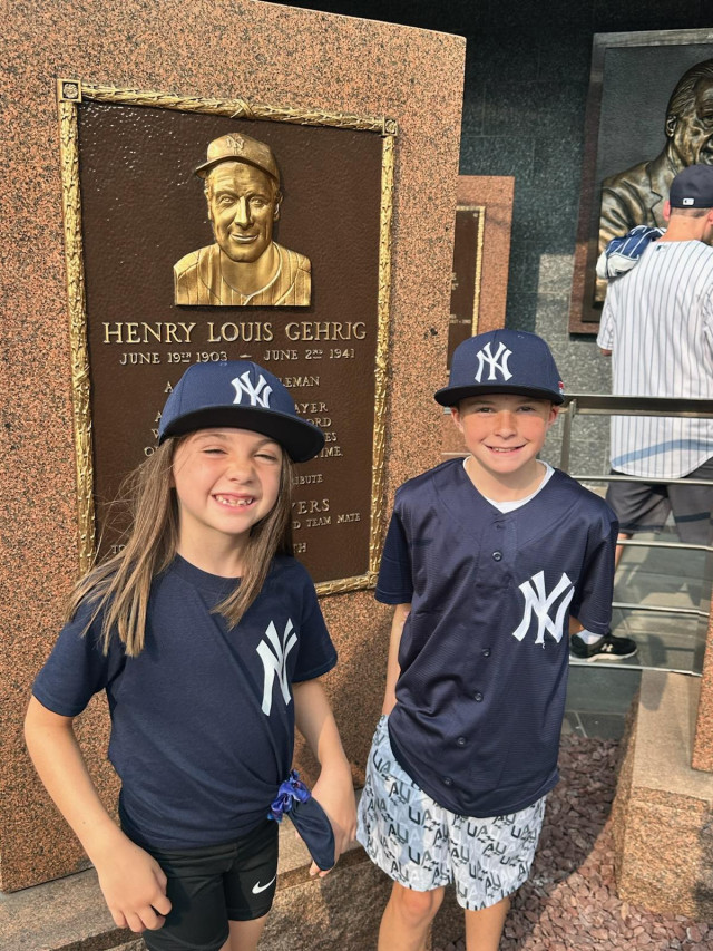 Kids in front of Lou Gehrig