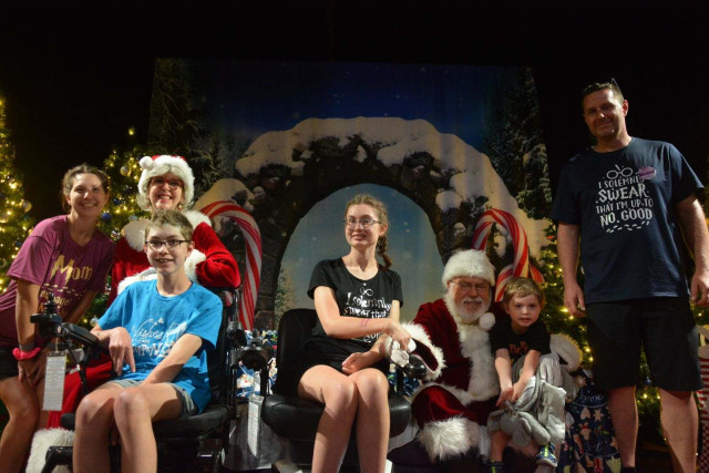 Nicholas and Family with Mr and Mrs Claus