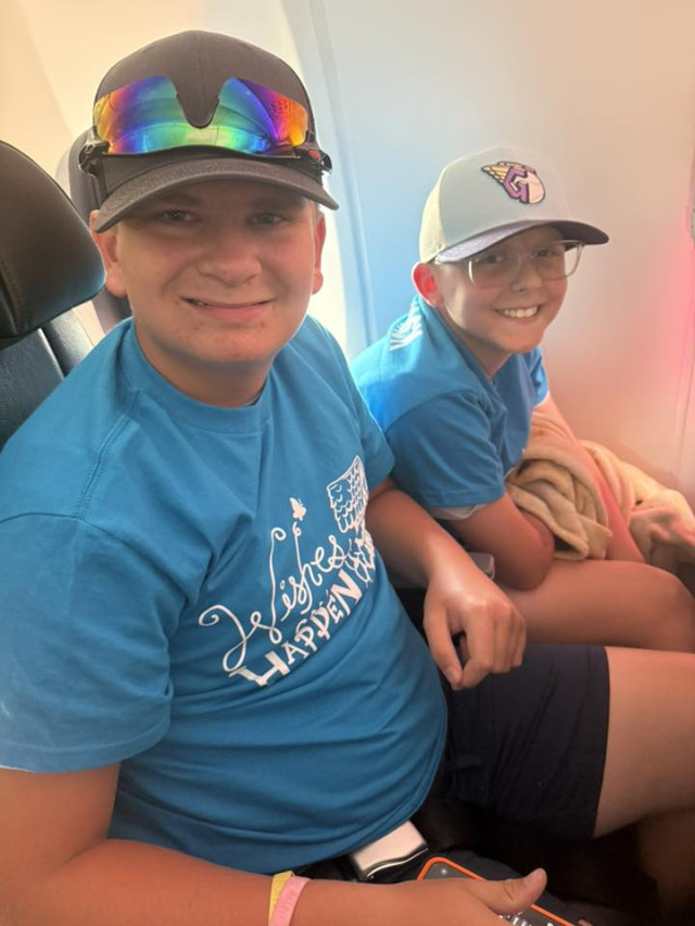 Jack and Bryson with Wishes Shirts on Plane