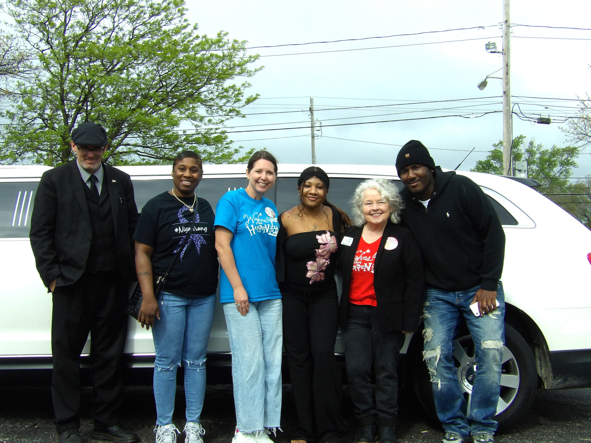 Group in Front of Limo
