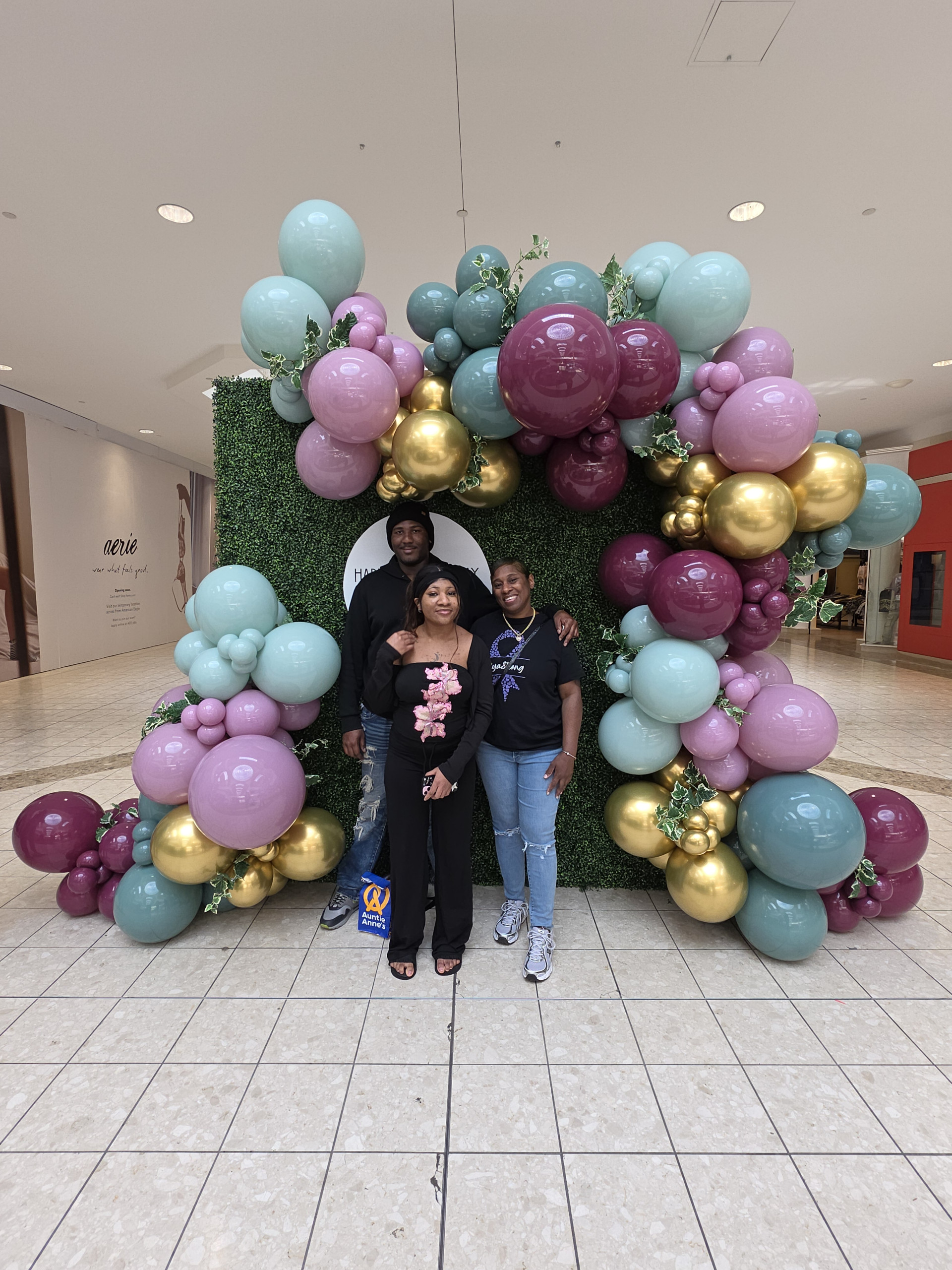 LaNiya and Family Balloons in Mall