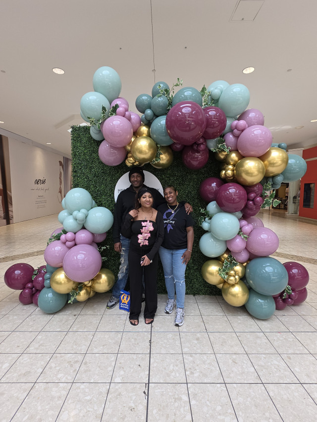 LaNiya and Family Balloons in Mall