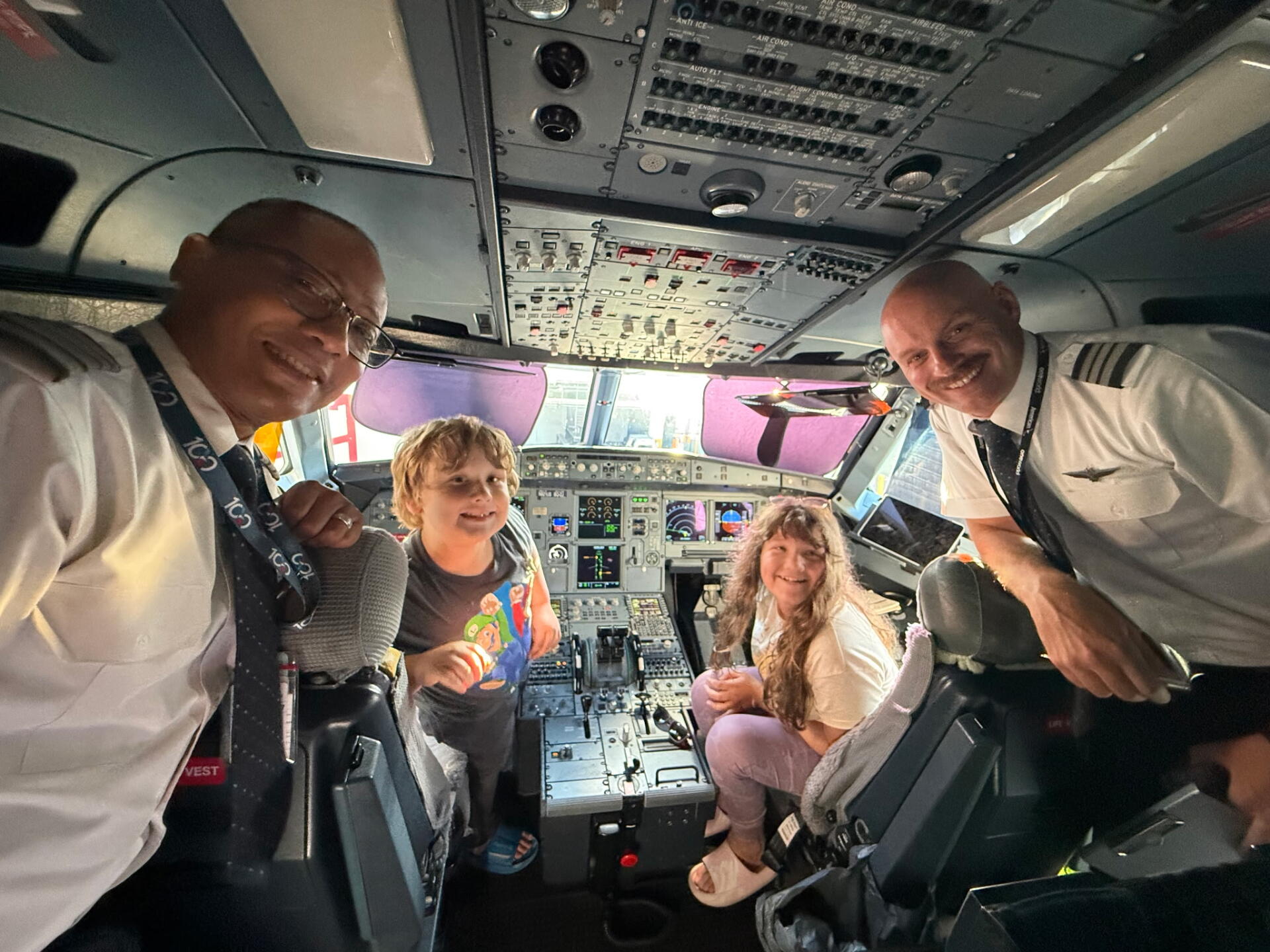 Emma and brother with Pilot