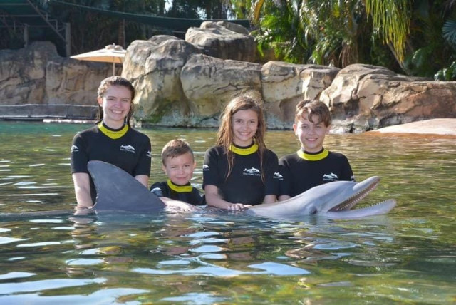 Kendall and Family with Dolphin
