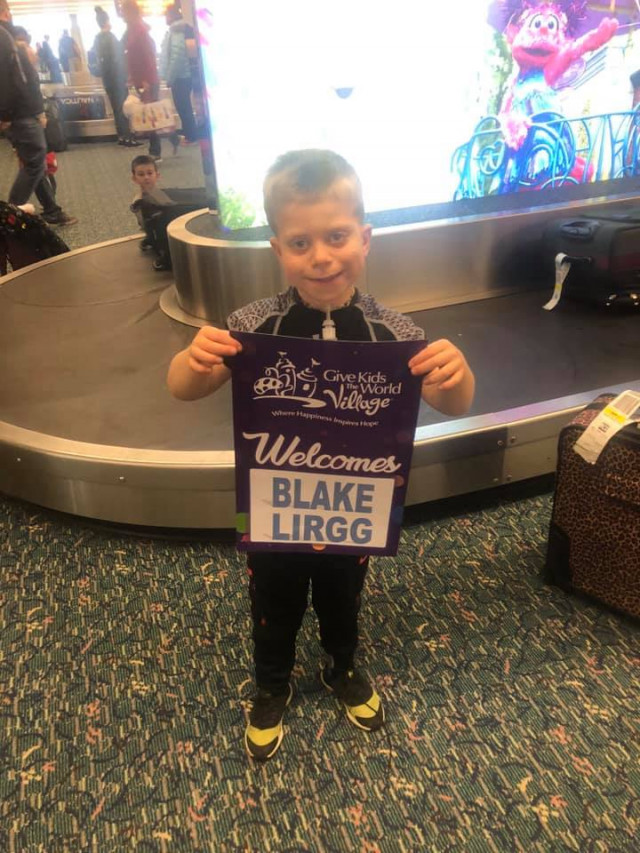 Blake Lirgg Holding GKTW Sign