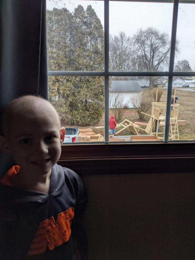 Jace Inside Window While Swing Being Built